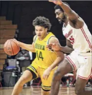  ??  ?? Siena's Jordan King drives past a defender in Saturday’s game. King, who finished with eight points, missed a late go-ahead 3-pointer.