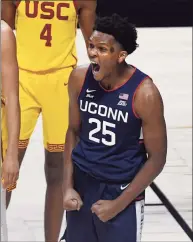  ?? Jessica Hill / Associated Press ?? UConn’s Josh Carlton reacts to a call in UConn’s favor during the first half against Southern California.