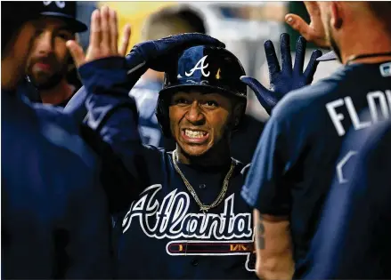  ?? RICH SCHULTZ / GETTY IMAGES ?? Atlanta second baseman Ozzie Albies is an early National League MVP candidate. He leads the Braves in home runs (9), RBIs (20), doubles (12), runs (29), hits (34) and slugging percentage ( .647) . Only the Yankees have scored more runs than the Braves.