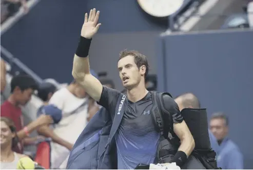  ??  ?? Beaten but not bowed, Andy Murray waves to his fans as he makes his exit from Flushing Meadows following his second-round defeat by Fernando Verdasco at the US Open. But Mum Judy was enormously impressed by his display as he continues his comeback.