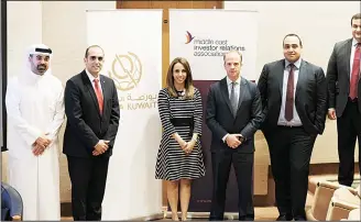  ??  ?? MEIRA Kuwait Chapter Founding Members with Ahmad Shamseldin, Head of Research at EFG Hermes.