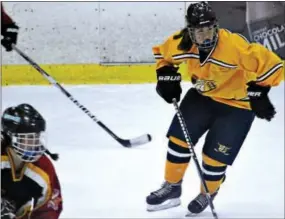  ?? CANDICE MONHOLLAN — DAILY LOCAL NEWS ?? Unionville freshman Madison Douchette notched six points in a 9-1 win over West Chester East on Friday night.