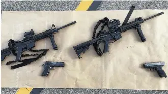  ?? San Bernardino County Sheriff’s Department via New York Times ?? The weapons used in the San Bernardino attack killed 14 people and injured two dozen more. They were bought by Enrique Marquez Jr., a longtime friend of Syed Rizwan Farook, one of the attackers.