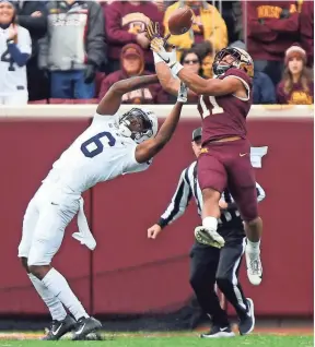  ?? STACY BENGS/AP ?? Minnesota defensive back Antoine Winfield Jr. intercepts a pass intended for Penn State wide receiver Justin Shorter on Nov. 9 in Minneapoli­s.