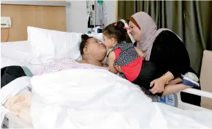  ?? Supplied photo ?? Eman Abdul Atti with her mother and niece at Burjeel Hospital Abu Dhabi. According to the hospital, Eman’s mother is ‘impressed’ with the changes in her health condition. —