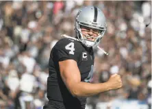  ?? Paul Kuroda / Special to The Chronicle ?? New Raiders head coach Jon Gruden is likely to try to work his magic and stick with Derek Carr as his starting quarterbac­k.