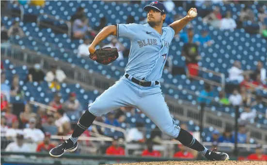  ?? BRAD MILL / USA TODAY SPORTS ?? Blue Jays relief pitcher Brad Hand lets fly to a Washington Nationals batter during the seventh inning Wednesday at Nationals
Park. The former National served up two homers for four funs to his old mates in an 8-5 Toronto loss.