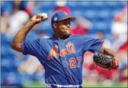  ?? JOHN BAZEMORE — THE ASSOCIATED PRESS ?? New York Mets relief pitcher Jeurys Familia works against the St. Louis Cardinals in the eighth inning of a spring training baseball game Tuesday in Port St. Lucie, Fla. Familia will be suspended for the first 15 games of the regular season under Major League Baseball’s domestic violence policy.