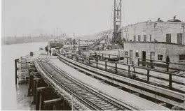  ?? Staff file photo ?? Wharf constructi­on on the Houston Ship Channel is shown in 1940. Job discrimina­tion met Black workers in Houston during the Great Migration of the early 20th century.