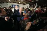  ?? GERALD HERBERT- ASSOCIATED PRESS ?? Democratic presidenti­al candidate, former Vice President Joe Biden, takes photos with supporters after speaking at a campaign event in Columbia, S.C., Tuesday.