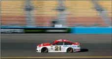  ?? AP PHOTO ?? Ryan Blaney drives through Turn 1 during practice for a NASCAR Cup Series auto race at Phoenix Internatio­nal Raceway on Saturday in Avondale, Ariz. Blaney will start in the second position for Sunday’s Monster Energy NASCAR Cup Series race.