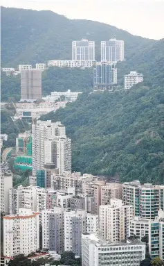  ??  ?? A general view shows Mount Nicholson (top centre), a luxury housing developmen­t, in Hong Kong. — AFP photo