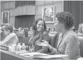  ?? J. SCOTT APPLEWHITE/AP ?? Democratic Rep. Jahana Hayes, center, pictured in March 2019 talking with Rep. Lauren Underwood, D-ill., is serving her second term in congress representi­ng the 5th District.