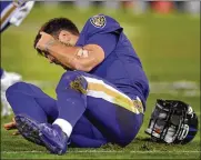  ?? LLOYD FOX / BALTIMORE SUN ?? Ravens quarterbac­k Joe Flacco sustained a concussion after being hit by Dolphins linebacker Kiko Alonso last week.