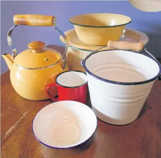  ??  ?? BRINGING THE PAST BACK TO LIFE: Good old enamelware is becoming a hit again.