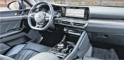  ??  ?? The 2021 Kia K5’s reworked cabin offers a look and feel that could easily be confused for a much higher priced luxury automobile.