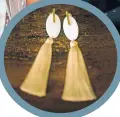  ??  ?? Earrings with special significan­ce designed by Rebecca and, above, she wears them on the day she marries husband Scott