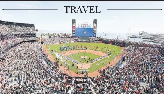  ?? GETTY ?? A pregame look at Oracle Park, home of the San Francisco Giants, on April 8 as the national anthem is played. The Giants hosted Miami on opening day of the 2022 regular season.