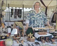  ?? LAURA JEAN GRANT/CAPE BRETON POST ?? Susan Spencer, owner of Hamilton, Ont.-based Spencer’s Mercantile, had a wide array of historic goods for sale during Culture Fête at the Fortress of Louisbourg.