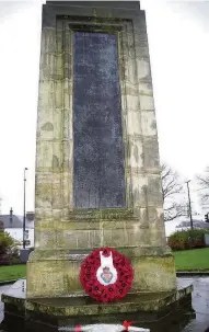  ??  ?? Not forgotten The wreath laid at the war memorial on Friday, November 11