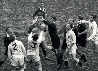  ??  ?? Colin Meads competes for the ball at a lineout against England in 1967.