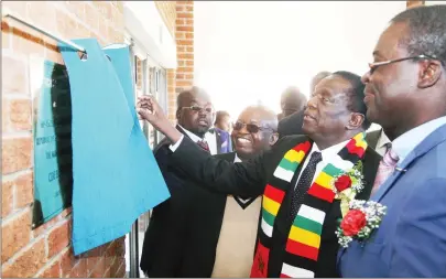  ?? Picture by Justin Mutenda ?? President Mnangagwa unveils a plaque at the official opening of Midlands State University Incubation Hub while Higher and Tertiary Education, Science and Technology Developmen­t Minister Professor Amon Murwira (right) and Acting Vice Chancellor Prof...