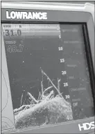  ?? Arkansas Democrat-Gazette/BRYAN HENDRICKS ?? A sensitive electronic graph can identify lake bottom structure like old bridge railings and brush piles where crappie and other game fish congregate.