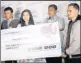  ??  ?? VOX FOR YOUTH: Vidya Vox handing over the cheque.