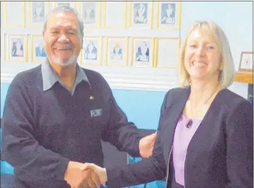  ??  ?? Lodge member Patrick Dunn presenting the cheque to primary school principal Andrea Nicholson.