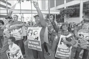  ?? Gina Ferazzi ?? PROTESTERS stage a rally Tuesday against a proposal for a large expansion of charter schools in Los Angeles. The plan has allies among a group of civic leaders as well as philanthro­pists and foundation­s.