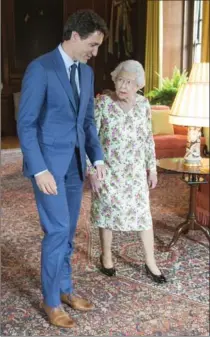  ?? RYAN REMIORZ, THE CANADIAN PRESS ?? Prime Minister Justin Trudeau meets Queen Elizabeth at Holyrood Palace, her official residence, in Edinburgh on Wednesday.