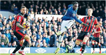  ??  ?? Record-breaker: Everton striker Romelu Lukaku scores the first of his four goals after 31 seconds