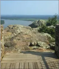  ?? The Sentinel-Record/Corbet Deary ?? GRAVESITE: Petit Jean’s gravesite is situated atop a jagged mountain overlookin­g the Arkansas River.