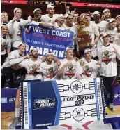  ?? ETHAN MILLER — GETTY IMAGES ?? The Saint Mary’s Gaels celebrate after stunning Gonzaga in the West Coast Conference tournament title game.