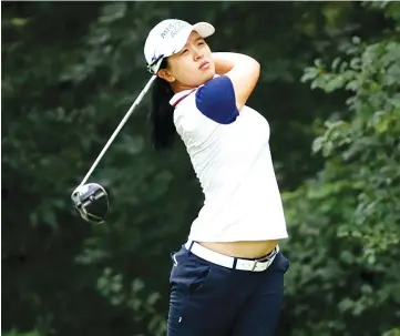  ??  ?? Sei Young Kim of South Korea hits her drive on the 13th hole during the second round of the 2017 KPMG PGA Championsh­ip at Olympia Fields Country Club on June 30, 2017 in Olympia Fields, Illinois. - AFP photo