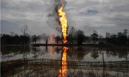  ??  ?? Flames and smoke billow from the Oil India well in Tinsukia, in the north-eastern state of Assam in June. Photograph: Biju Boro/AFP/Getty Images