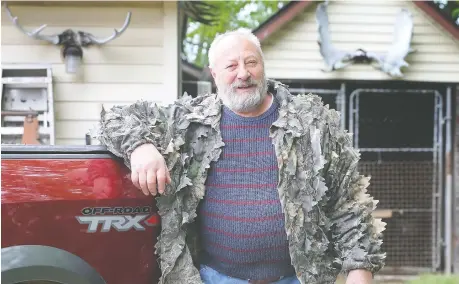  ?? DAN JANISSE ?? Mike Catari, seen here at his Lasalle home on Thursday, says he has been seeking answers from government officials regarding the upcoming moose-hunting season. He and his friends regularly go on a hunting trip but don’t know if COVID-19 restrictio­ns will not allow it this year.