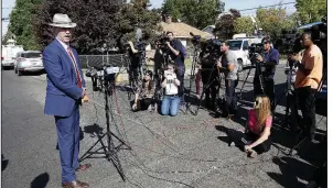  ??  ?? AP/RICH PEDRONCELL­I FBI agent Sean Regan talks about the explosive device addressed to U.S. Sen. Kamala Harris that was found Friday at a Sacramento, Calif., post office.