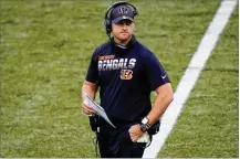  ?? BRYAN WOOLSTON / AP 2020 ?? Bengals head coach Zac Taylor said Cincinnati’s decision not to use a franchise tag this year gives the team more flexibilit­y going into a season with a lower salary cap.