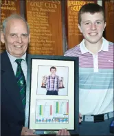  ??  ?? Baltinglas­s Golf Club Captain Louie Fagan presents Joseph Byrne with a framed scorecard of his course breaking record score of 68 gross.