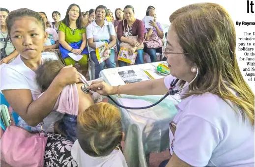  ?? Government. ?? Free checkup Mothers and infants from Malabon avail of the free checkup and medicines provided by the Navotas municipal