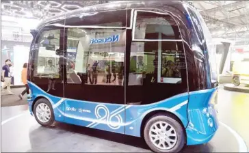  ?? CHINA OUT/AFP ?? An Apolong self-driving minibus by King Long is exhibited at the Consumer Electronic­s Show (CES) Asia in Shanghai on June 13.