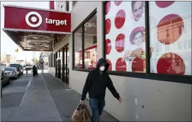  ?? MARK LENNIHAN — THE ASSOCIATED PRESS FILE ?? Target is the latest big U.S. retailer to show that it’s prospering during the pandemic. The Minneapoli­s company reported Wednesday that its online sales surged 155% in the three months that ended Oct. 31.