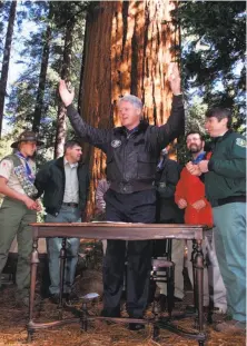  ?? Larry Downing / Reuters 2000 ?? In 2000, President Bill Clinton designates Giant Sequoia National Monument, which will now be revisited.