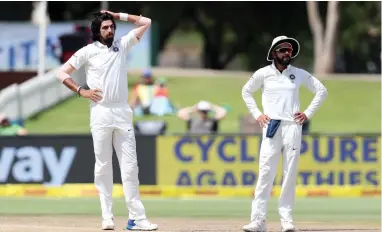  ??  ?? TRYING TOO HARD? Ishant Sharma and Virat Kohli of India during the second Test at Centurion. Critics suggest that Kohli’s approach is detrimenta­l to the team.