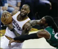  ?? The Associated Press ?? EASTERN STAR: LeBron James (23), here going up for a shot against Boston’s Jae Crowder, comes off an 11-point effort with 34 in Game 4 of the NBA Eastern Conference finals, a 112-99 Cleveland victory over the Celtics Tuesday night. The Cavaliers look...