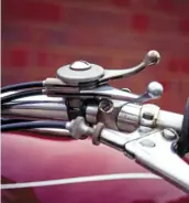  ??  ?? Above: A delightful­ly pre-war relic is this neat twin-lever control. It operates both the valve lifter and the magneto ignition advance