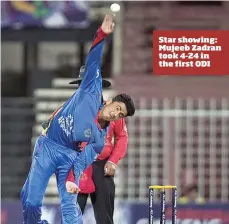  ??  ?? Star showing: Mujeeb Zadran took 4-24 in the first ODI