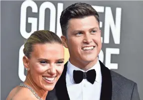  ?? FRAZER HARRISON/GETTY IMAGES ?? Scarlett Johansson and Colin Jost attend the 77th annual Golden Globe Awards at The Beverly Hilton Hotel on Jan. 5.