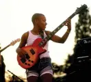  ?? ?? Meshell Ndegeocell­o performing in the mid 90s. Photograph: David Redfern/Redferns